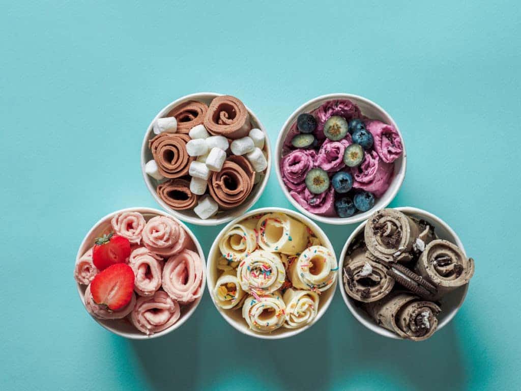 overhead view of cups of rolled ice cream