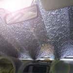 Aluminum coverlet on the windshield of the car to protect from heat and sun inside.