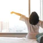 waking up in hotel room with sunshine