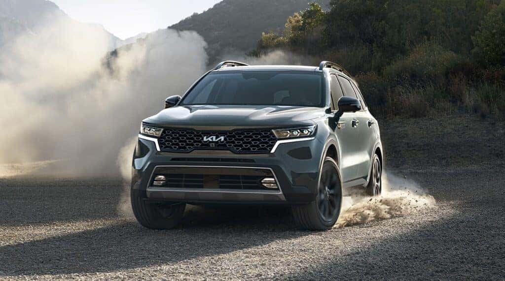 Kia Sorento SUV kicking up dust on road