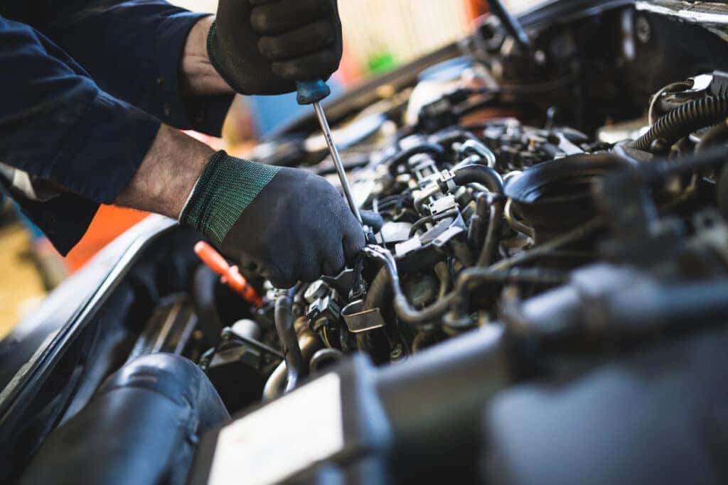 Vehicle Repair or Replace? Auto mechanic service and repair