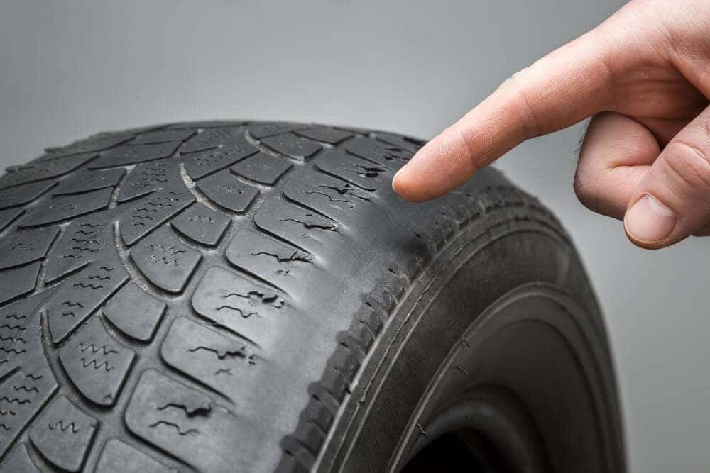 Unbalanced and Worn Car tire