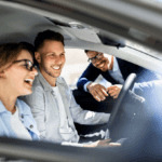 car buyers test driving a car