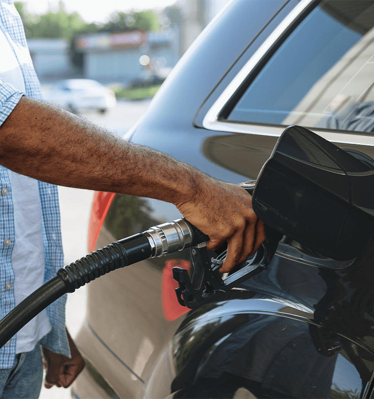 What Type of Gas is Best for My Car? | Giambalvo Chrysler Dodge Jeep RAM in York, PA | Person putting gas nozzle into car