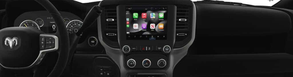 Android Auto vs. Apple CarPlay at Stetler DCJR in York, PA | Apple carplay displayed on center console for a RAM truck 