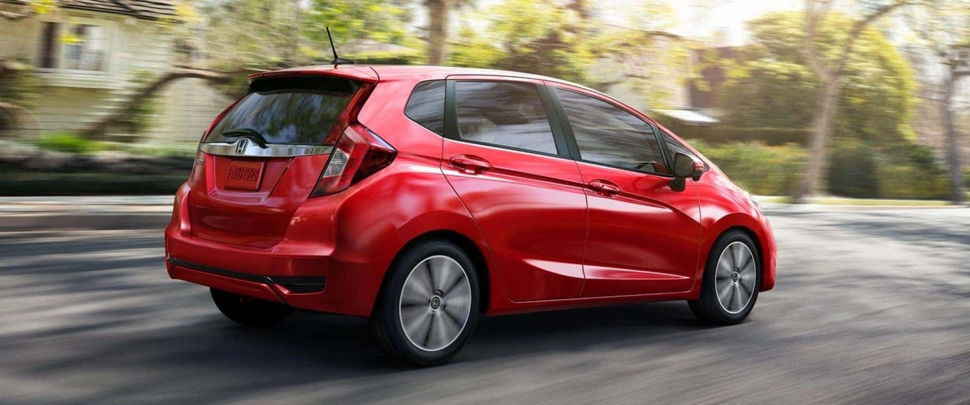 Honda_Fit_Red_Driving_In_City