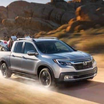 Honda_Ridgeline_Driving_On_Dirt_Road