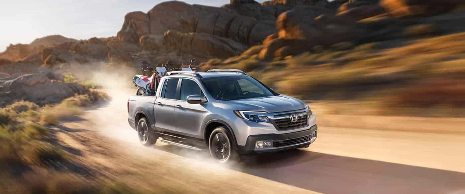 Honda_Ridgeline_Driving_On_Dirt_Road