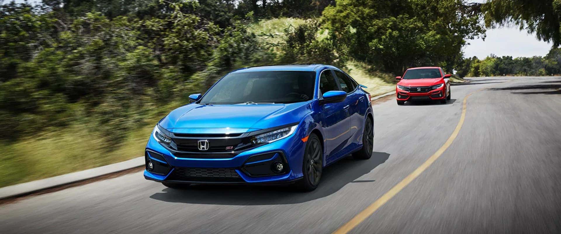 Honda_Civic_Si_Sedan_Driving_Back_Road