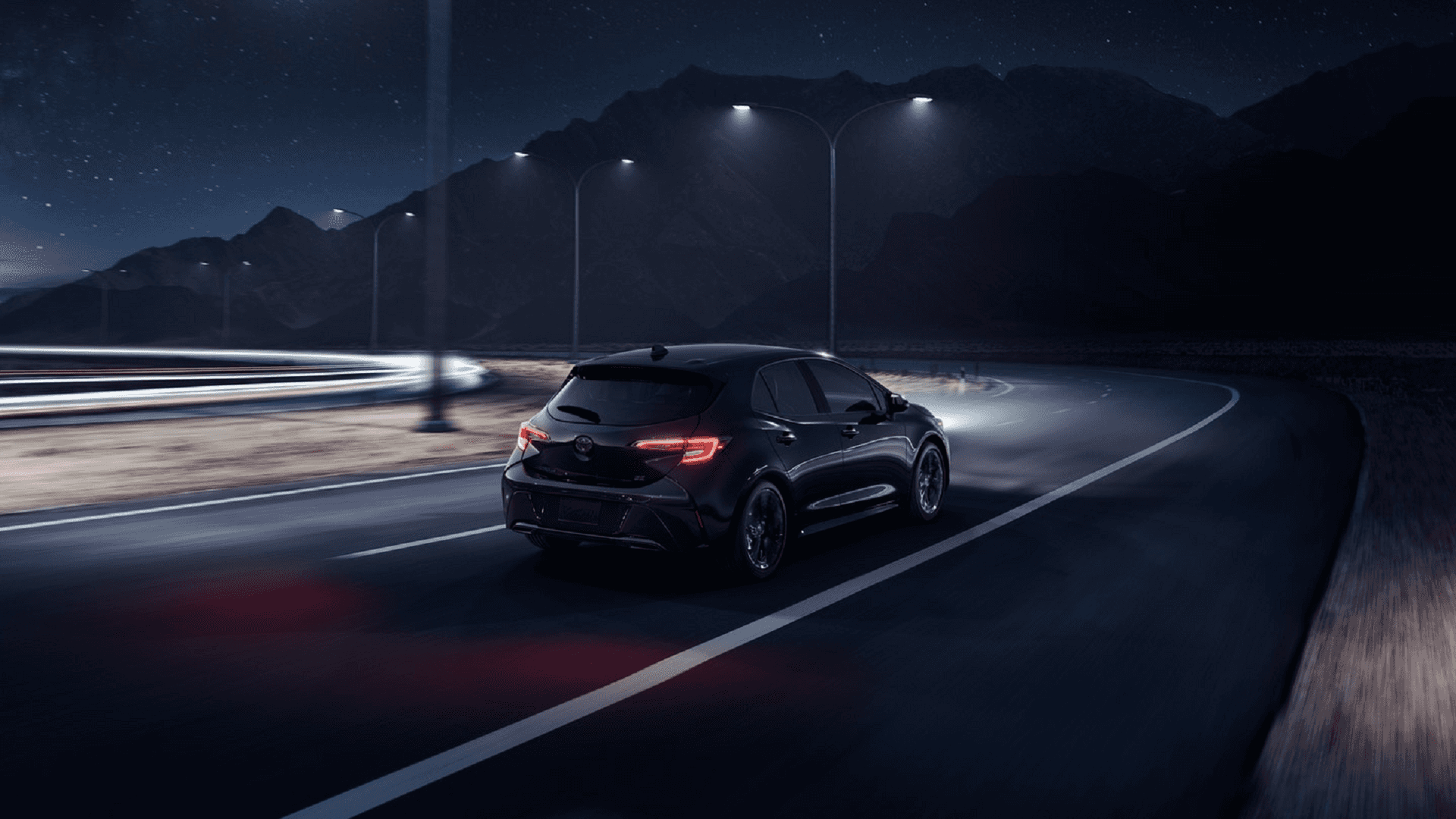 Toyota_Corolla_Hatchback_Driving_At_Night