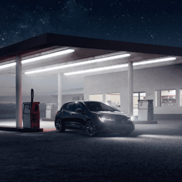 Toyota_Corolla_Hatchback_Parked_At_Gas_Station_Night