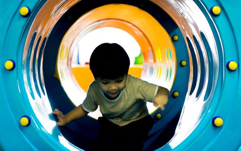 boy playing in indoor play center - Makutu's Island