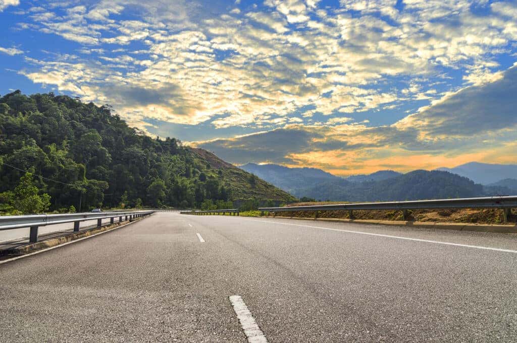 road at foot of mountains