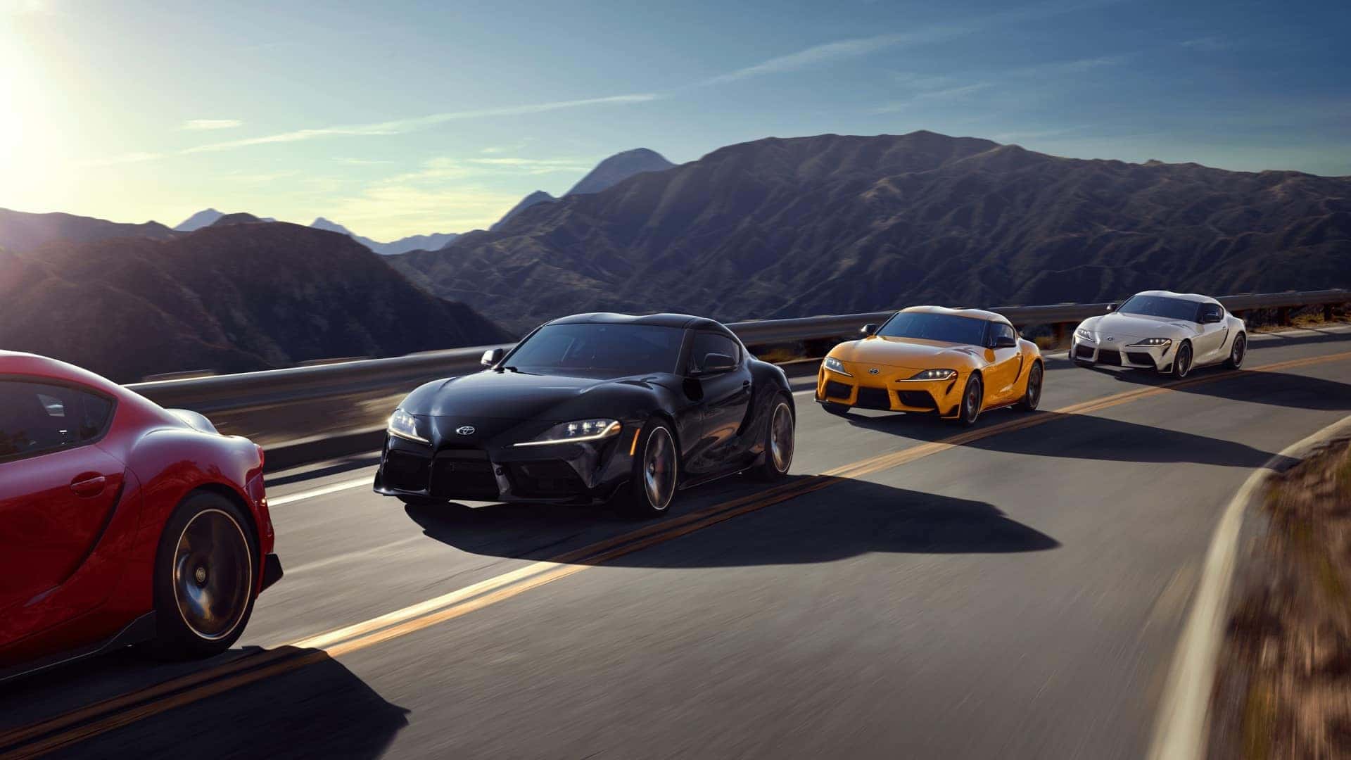 Toyota_Supra_Driving_In_A_Group