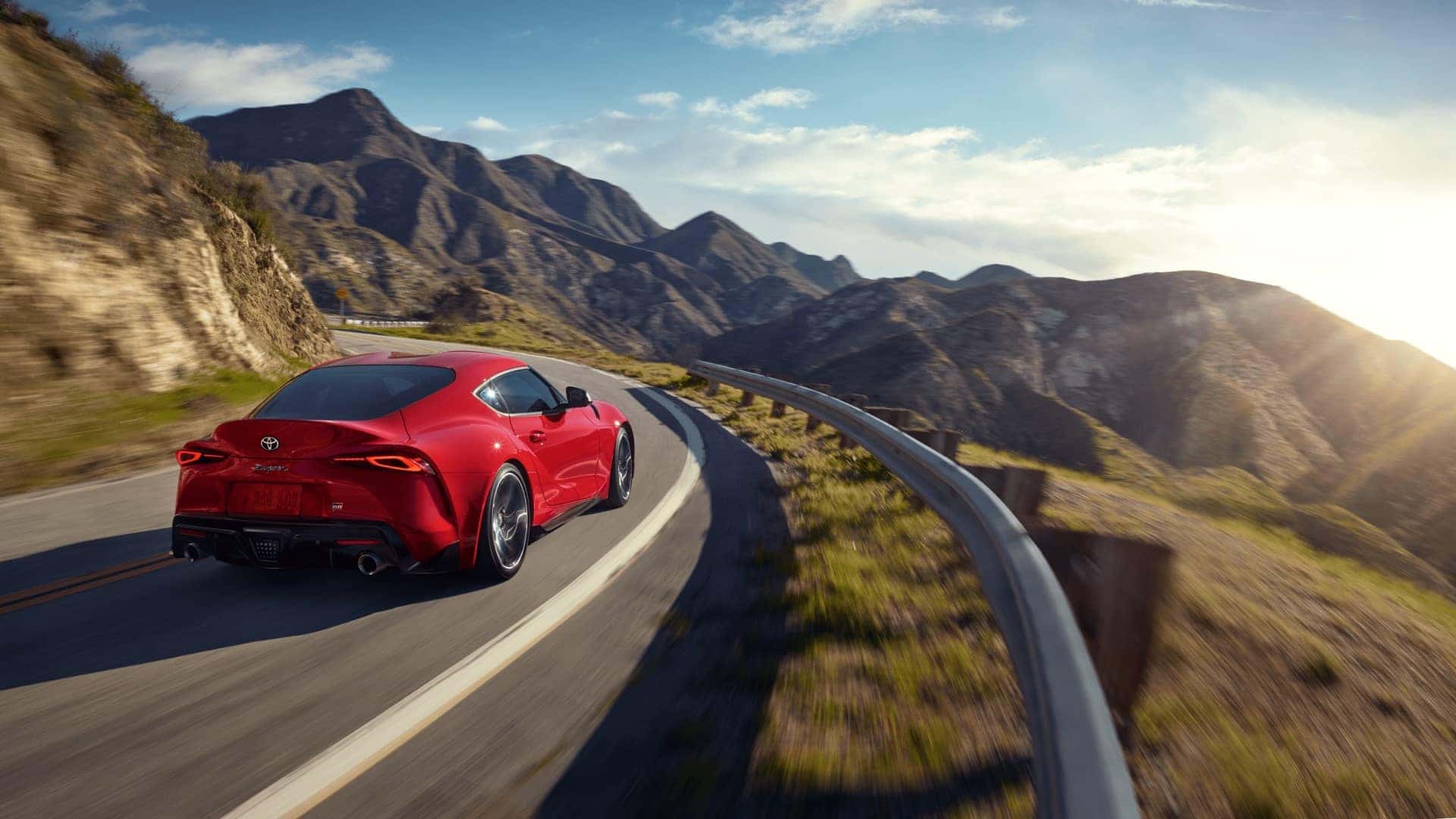 Toyota_Supra_Driving_On_Country_Road