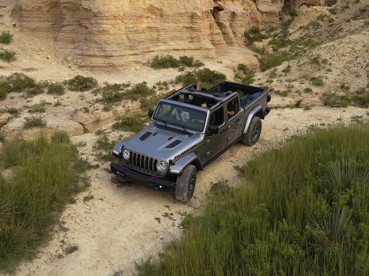 2021 Jeep Gladiator Rubicon gray off-roading in canyon