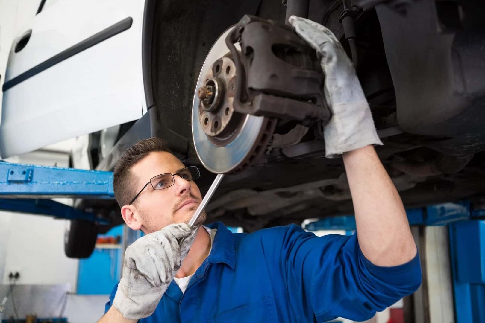 Man Working on Brakes