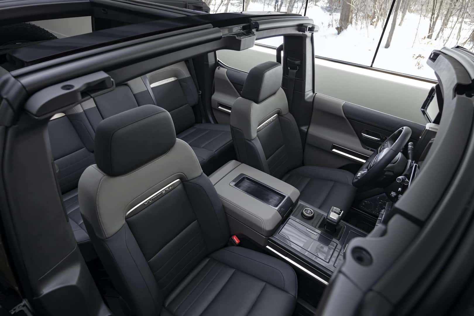 The GMC HUMMER EV SUV debuts in the low-contrast Lunar Shadow interior and includes a spacious cargo area and an architecturally inspired cabin.