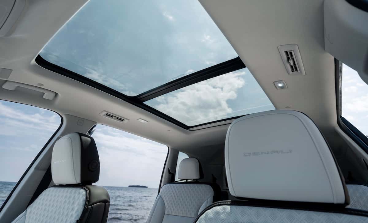 Detail shot of the 2024 GMC Acadia Denali’s premium panoramic glass sunroof.