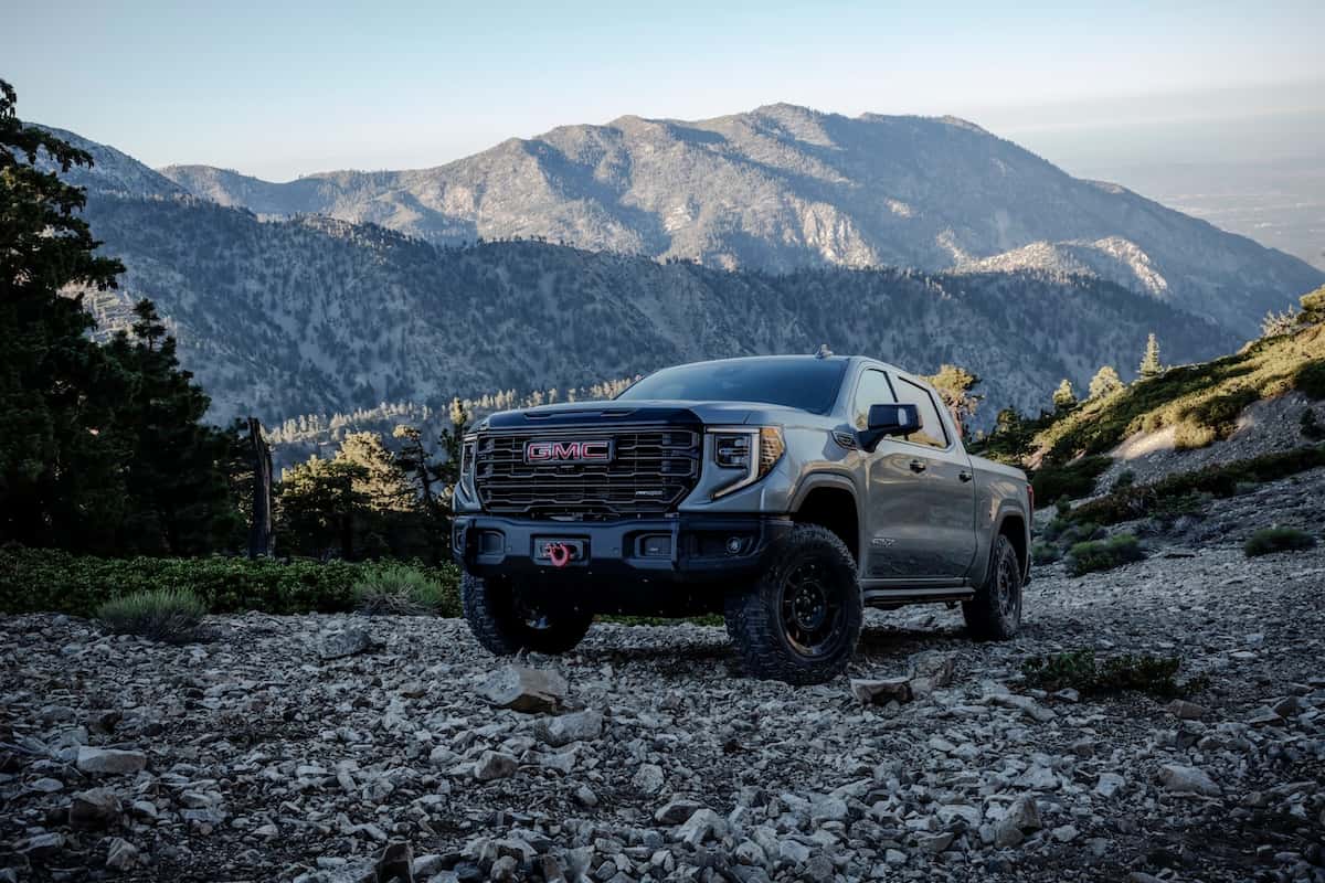 2024 GMC Sierra 1500 AT4X AEV Edition Crew Cab Short Box in Sterling Metallic; 3/4 driver-side front.