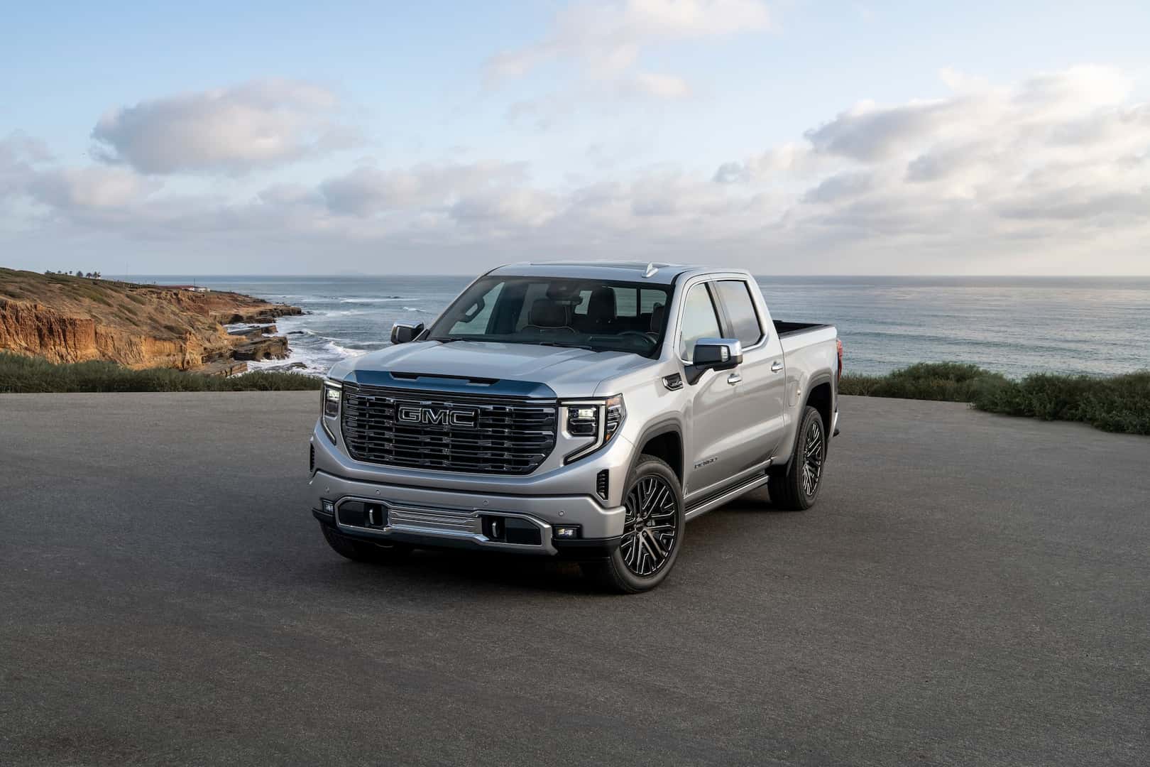 The GMC Sierra Denali Ultimate parked on the California coast near San Diego, finished in Quicksilver Metallic.