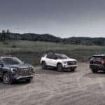 Pack shot of the next generation GMC Terrain lineup, including Elevation, AT4 and Denali. MY26 Terrain AT4 and Denali shown. MY25 will launch with Elevation trim.