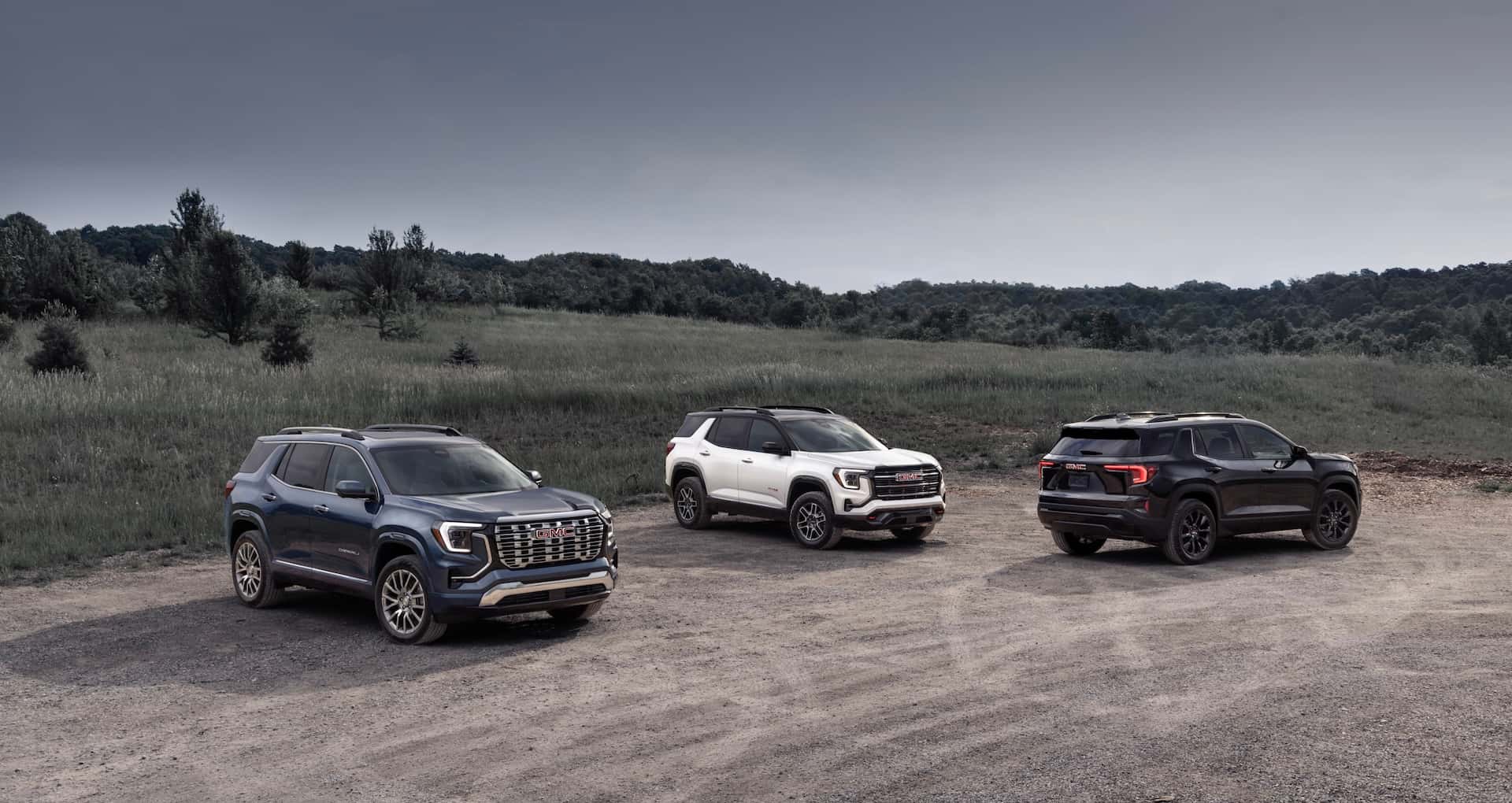 Pack shot of the next generation GMC Terrain lineup, including Elevation, AT4 and Denali. MY26 Terrain AT4 and Denali shown. MY25 will launch with Elevation trim.