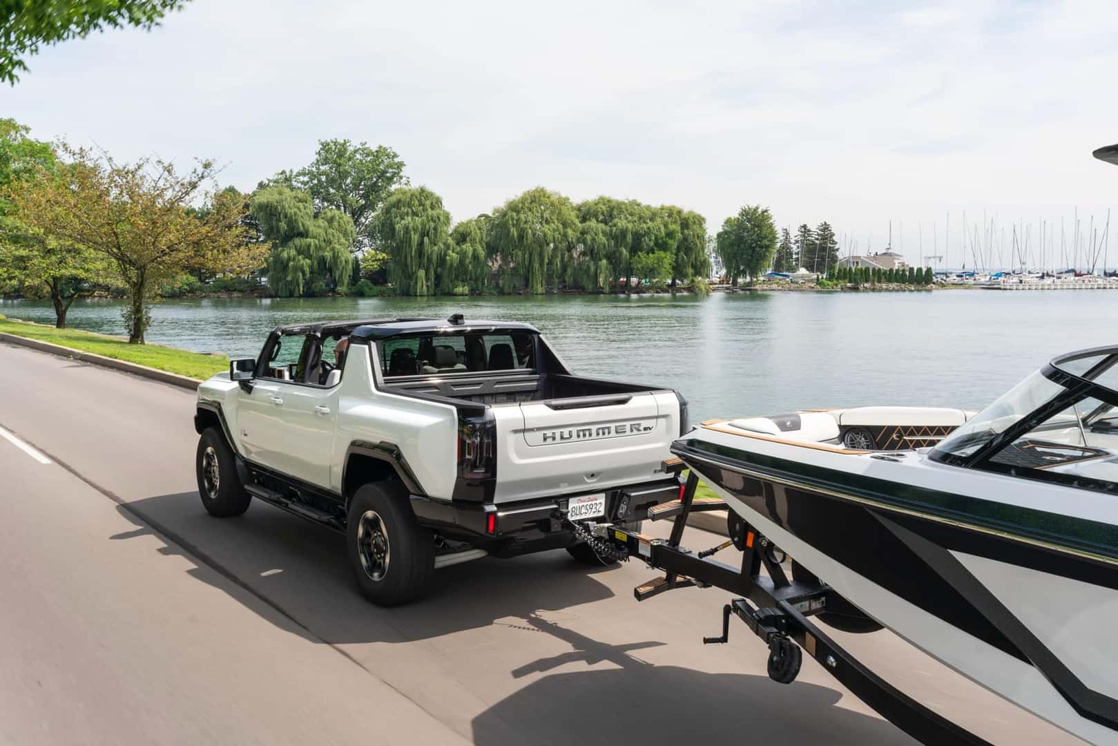 2022 GMC Hummer EV towing a boat