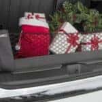 Cargo net organizes gifts in the back of a GMC SUV from Valley GMC in Auburn Wa