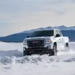 2021 GMC Canyon AT4 driving through snow
