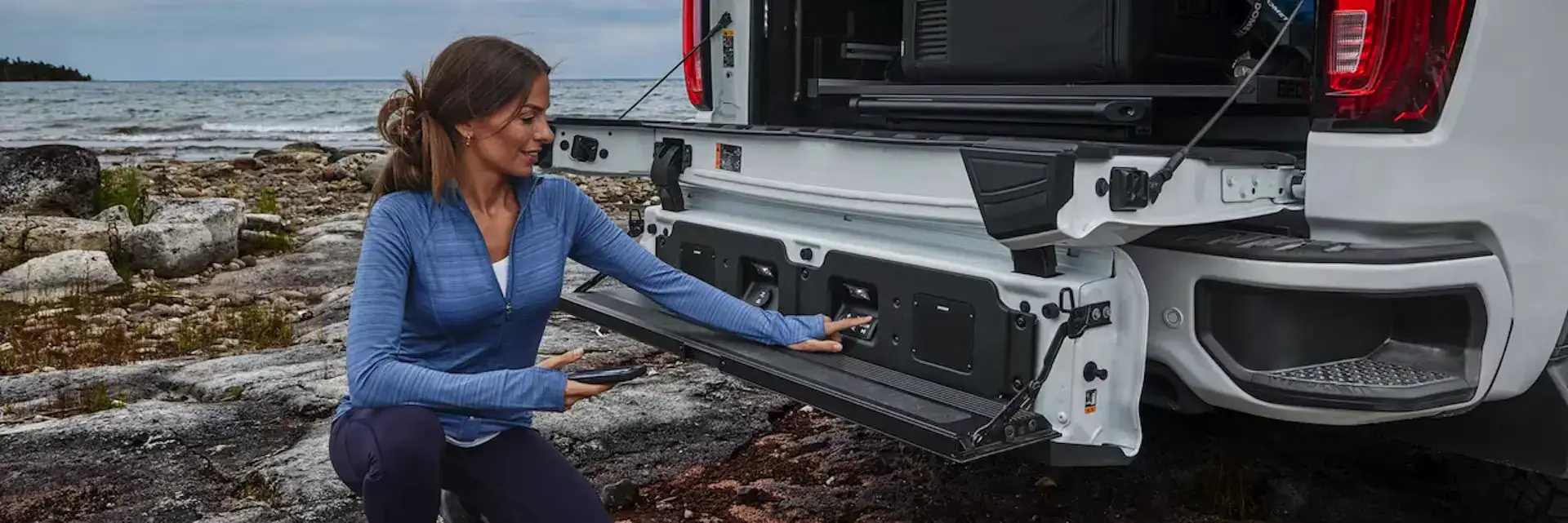 2026 GMC Life Adventure tailgate accessories with driver