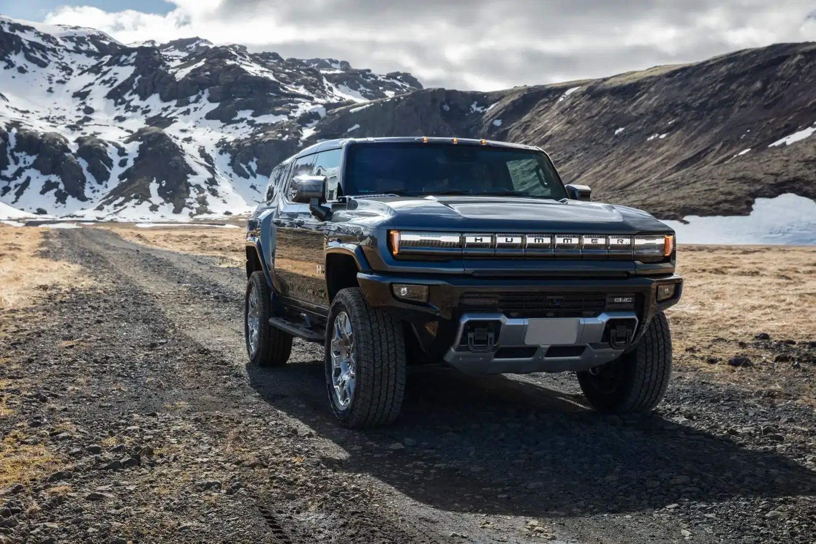 2025 GMC Hummer EV off roading in the mountains