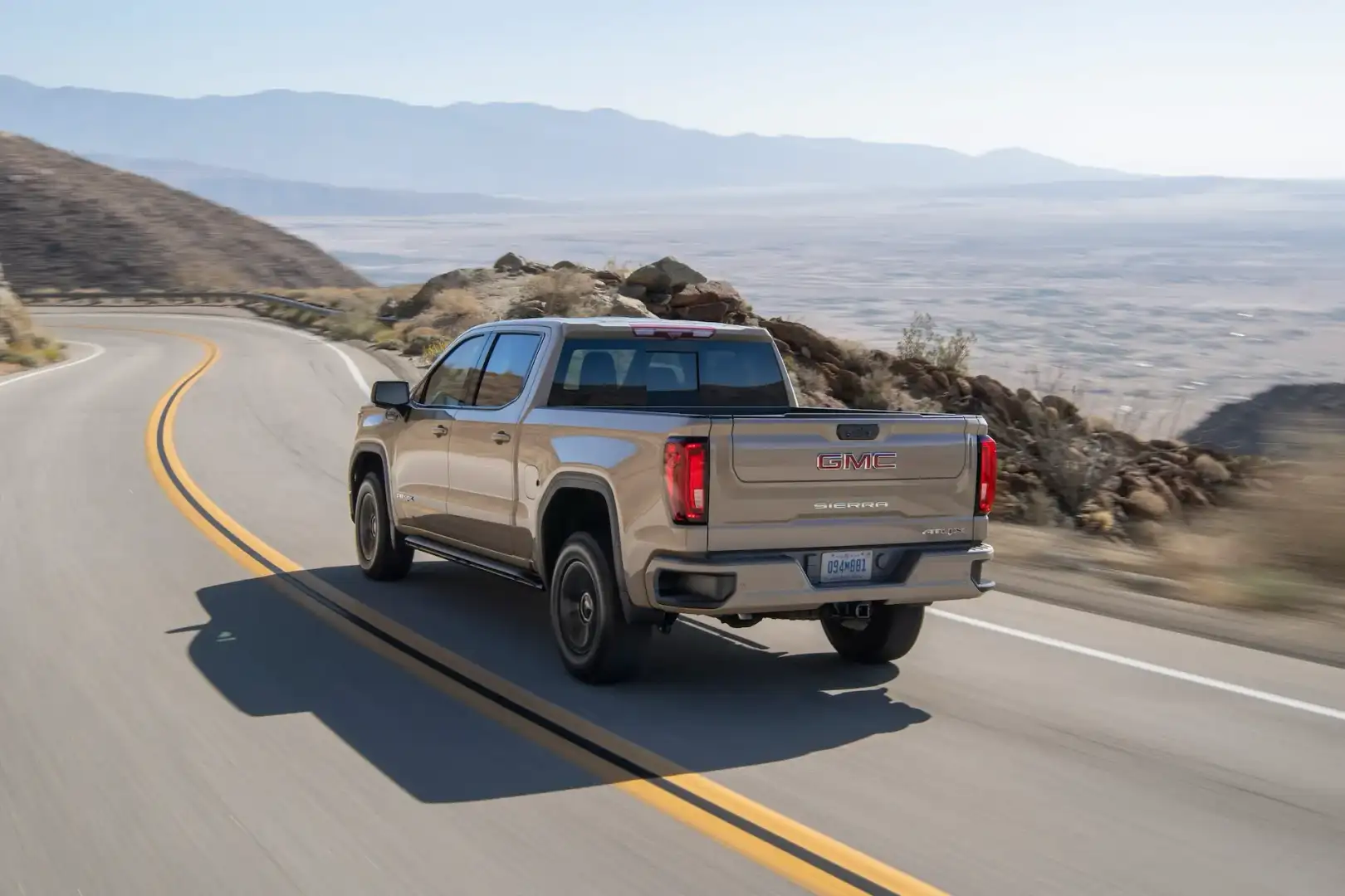 2022 GMC Sierra 1500 AT4X driving on a mountain road
