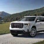 2026 GMC Acadia Denali Ultimate parked on gravel road
