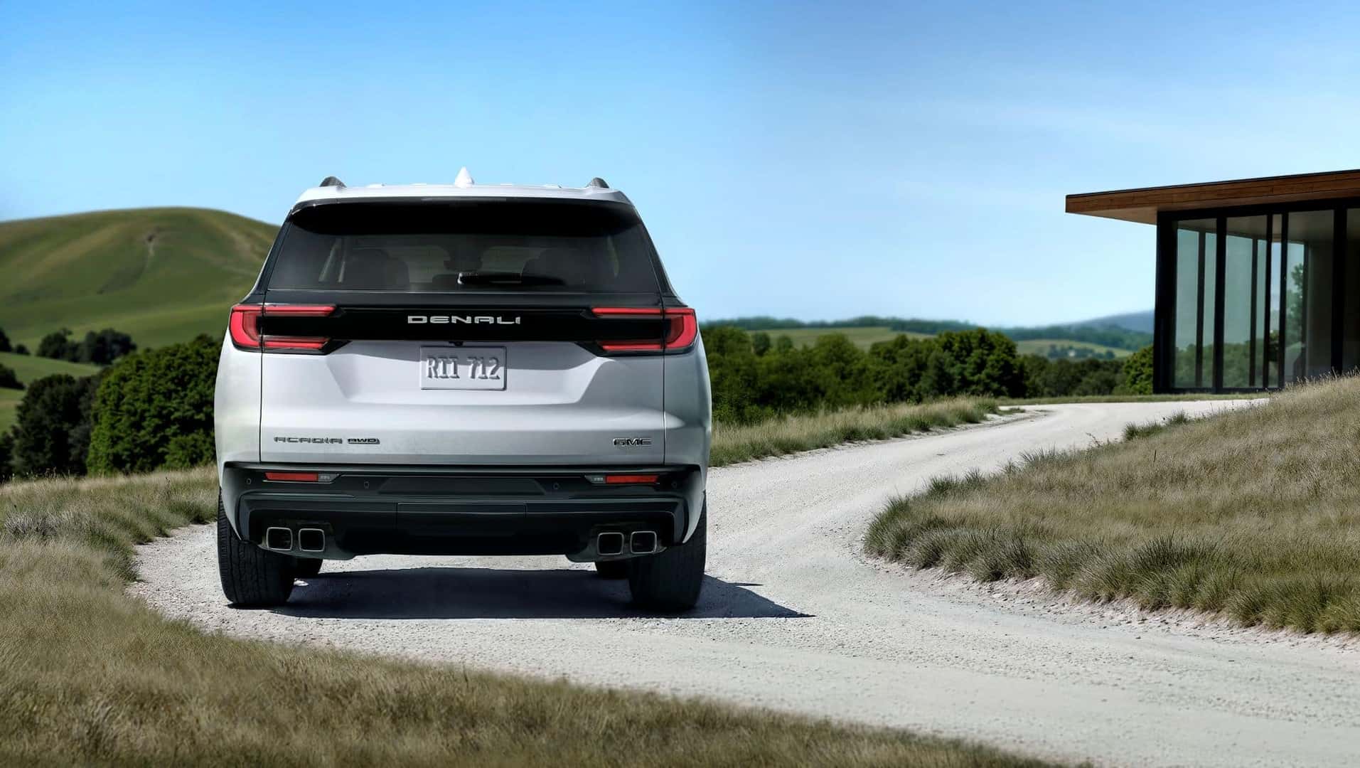 The Fuel-Efficient 2026 GMC Acadia Denali Ultimate Driving Casually Into The Drive Way
