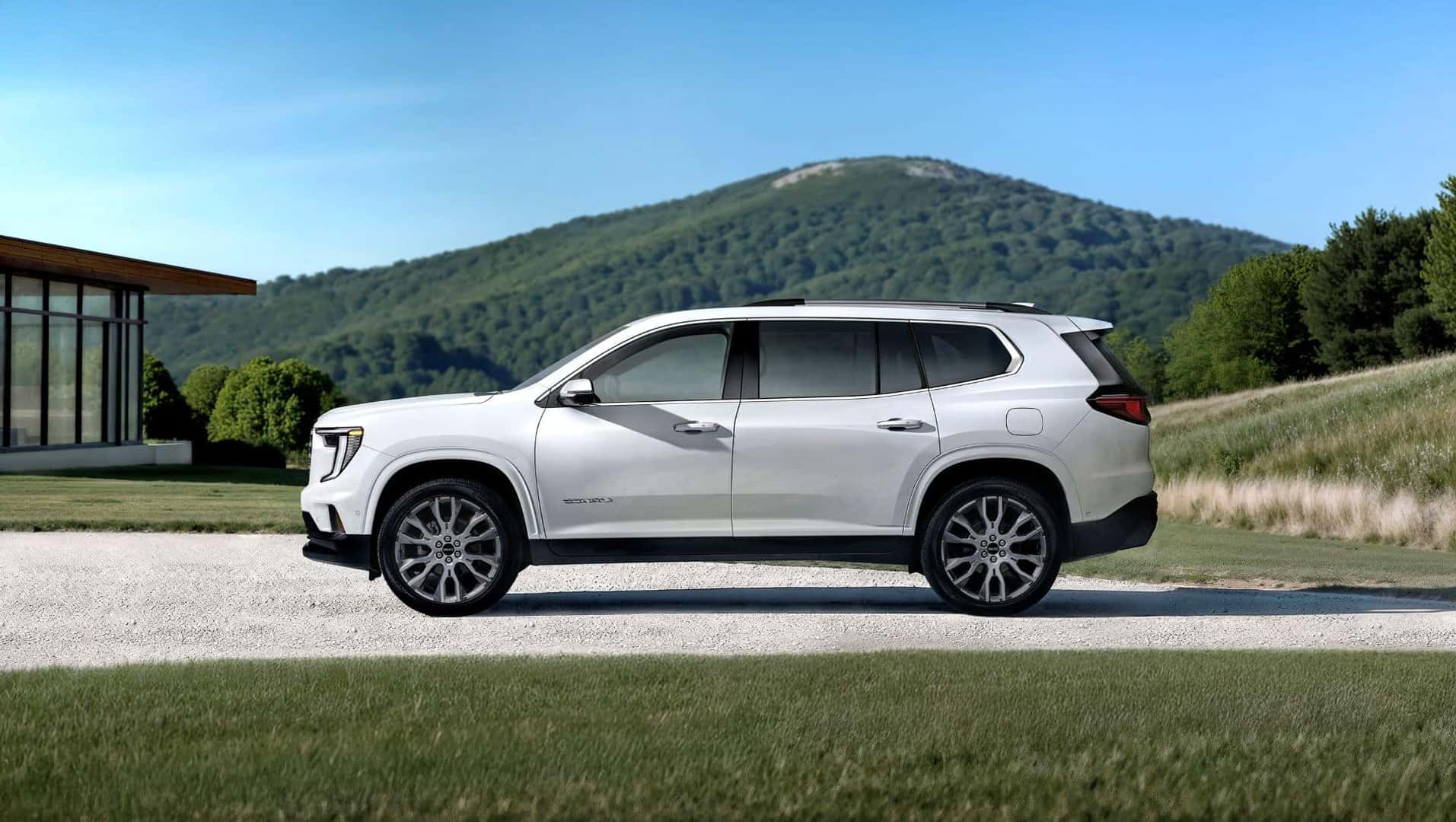 The Family Friendly 2026 GMC Acadia Denali Ultimate's Gloriously White Side Profile