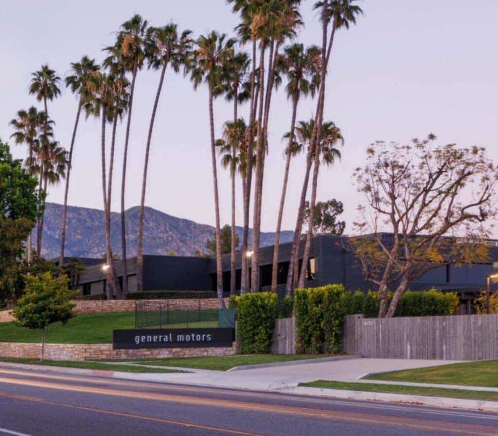 The Beautiful Advanced Design Pasadena Studio's Building, With A Few Palm Trees In Front