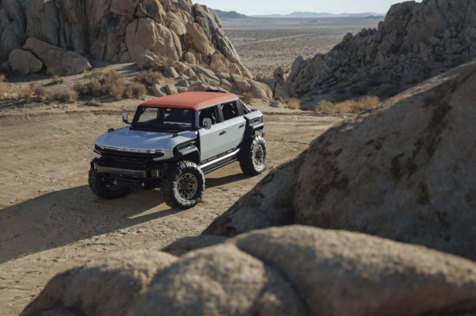 The Detailed GMC Hummer X SUV Concept. Parked In A Dusty And Rocky Area
