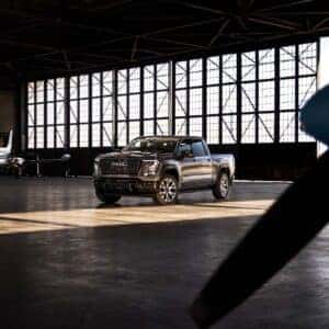 2027 GMC Sierra Denali Ultimate in an Airport Plane Hanger