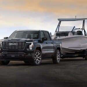 2024 GMC Sierra Denali Ultimate Towing a Boat