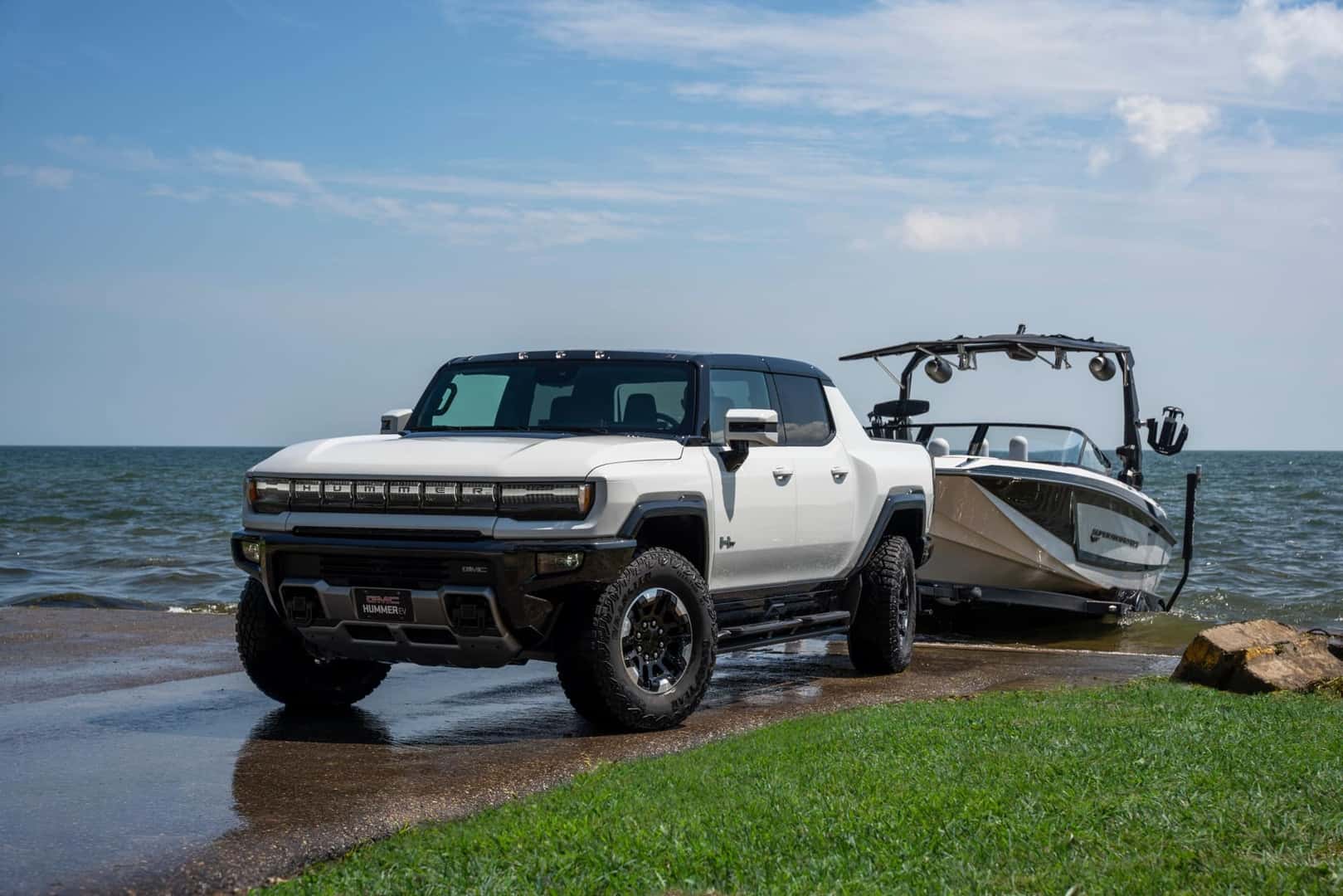 The Powerful 2023 GMC Hummer EV Towing A Boat Out Of The Water Successfully