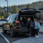 2026 GMC Acadia at a school carpool line in Auburn WA on a clear September morning