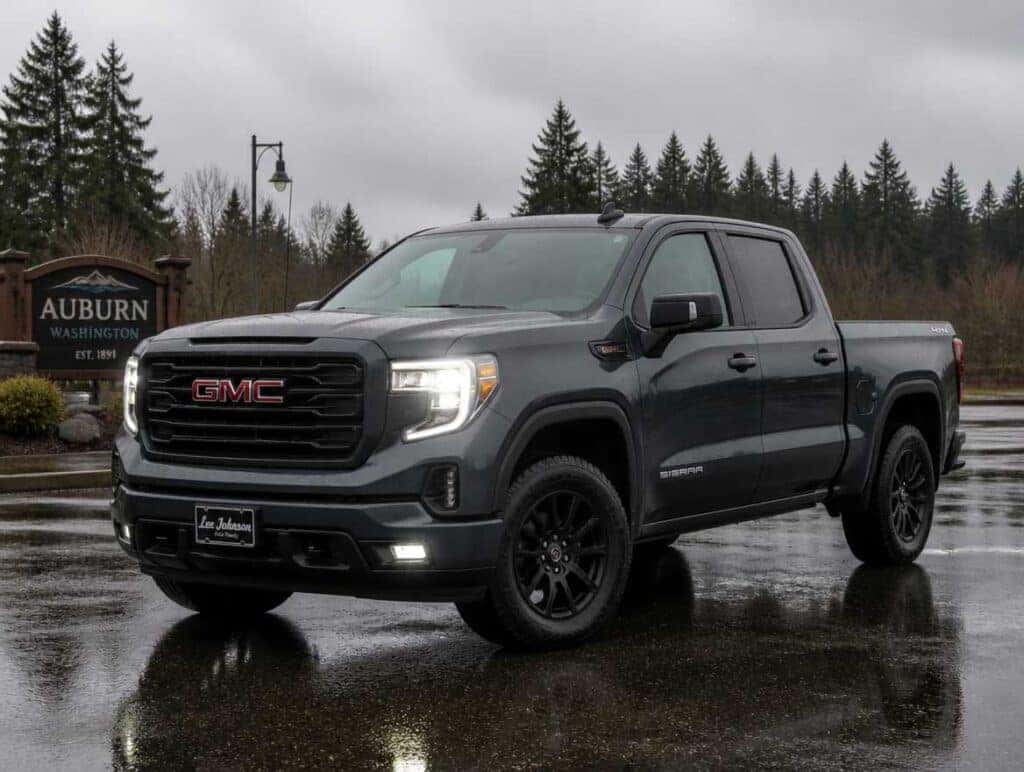 2026 GMC Sierra 1500 on wet pavement in Auburn WA ready for fall rainy season