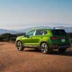 Green 2025 VW Taos on a canyon