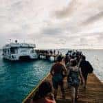 walking to board a pontoon houseboat