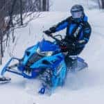 snowmobile loan and customer out riding