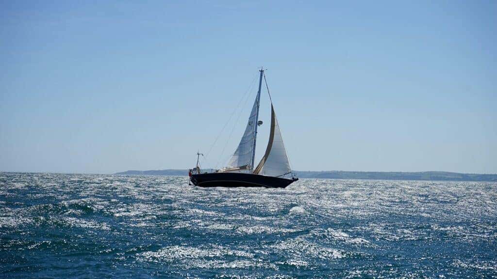 a white and black sailboat