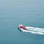 a red and white motorboat