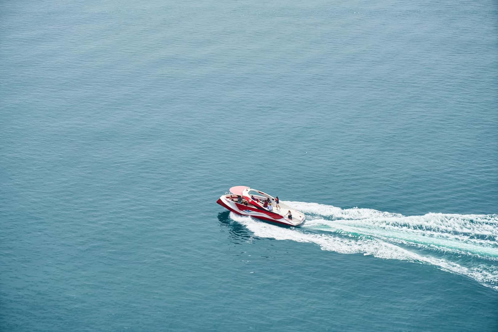 a red and white motorboat