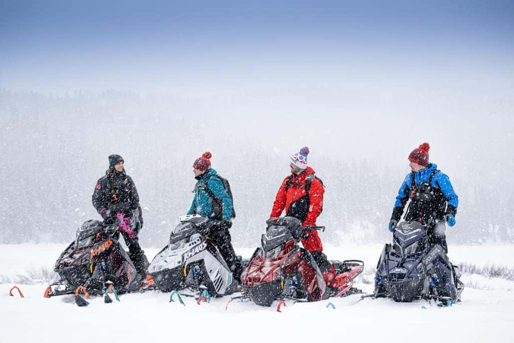 Snowmobiles in winter landscape